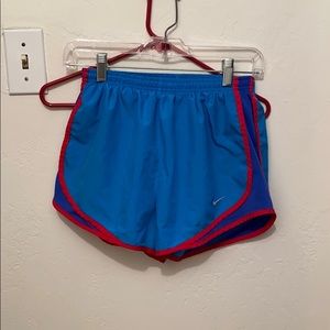 Blue/pink Nike running shorts. Size S.